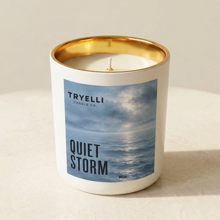 Quiet Storm candle from TryElli Candle Co. in an ivory jar with a gold interior