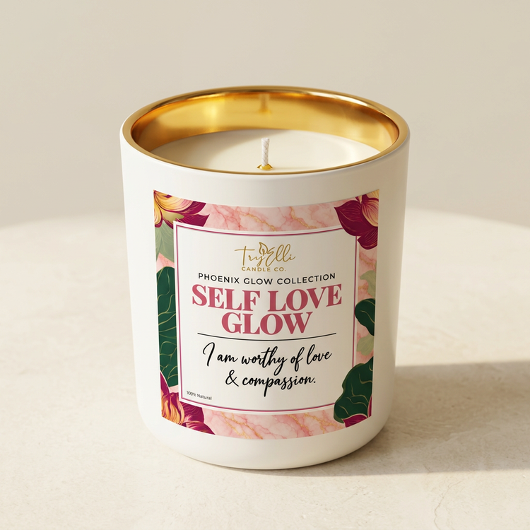 Self Love Glow candle from the Phoenix Glow Collection in an ivory jar with a gold interior
